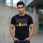 Man wearing a black t-shirt with 'Fantasy Football Loser' text and emoji outdoors.