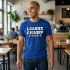 Man wearing a blue t-shirt with 'League Champ' text in a casual setting